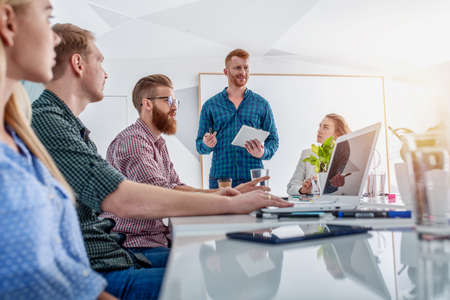 Business people that work together in office. Concept of teamwork and partnership