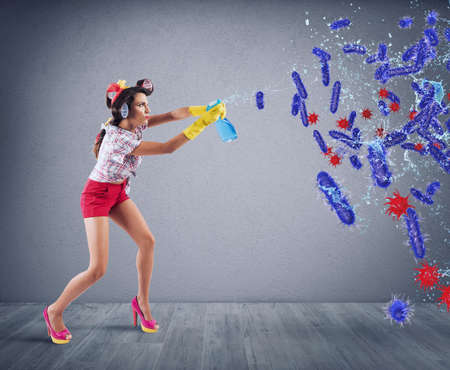 Funny housewife cleans and disinfects to keep germs, viruses and bacteria away.