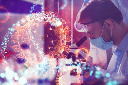 Doctor in the laboratory analyzes samples under a microscope.