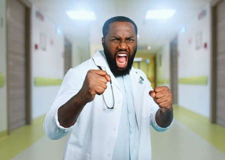 Brave medic fight against covid-19 coronavirus. Blue backgroundの写真素材