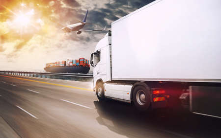 Cargo ship, truck and airplane traveling to deliver the goodsの写真素材