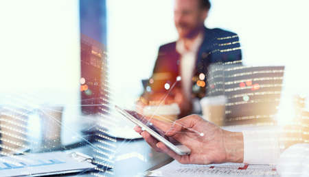 Businesswoman in office connected on internet network. concept of startup companyの写真素材