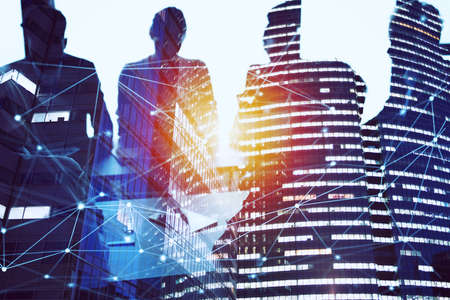 Business people collaborate together in office.