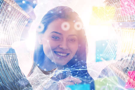 Young businesswoman working with her teammates in office.の写真素材