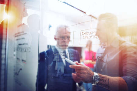 Business people that work together in office. Concept of teamwork and partnership