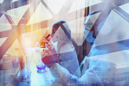 Doctor in the laboratory analyzes samples under a microscope. Pharmaceutical treatment concept.