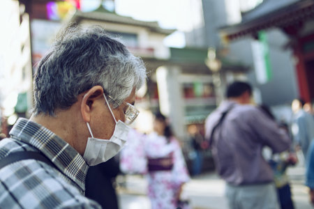 Senior man with face mask to protect against covid-19