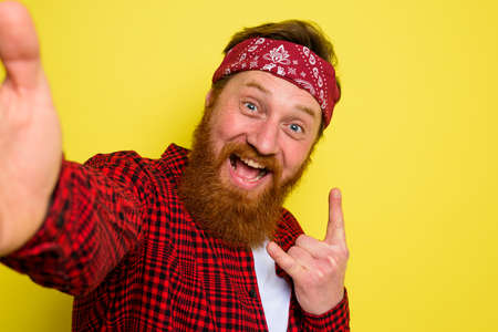 Happy man with beard and bandana in head