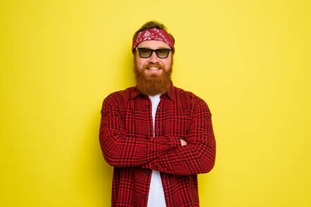 Happy man with beard and bandana in headの写真素材