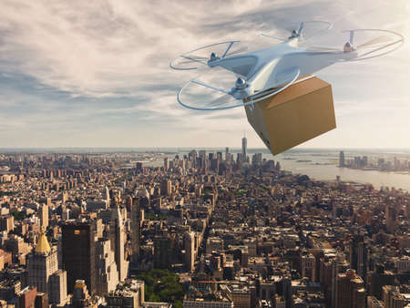 UAV drone flying over the city to deliver a shipmentの写真素材