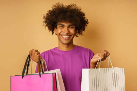 Happy man is happy to buy from shopsの写真素材