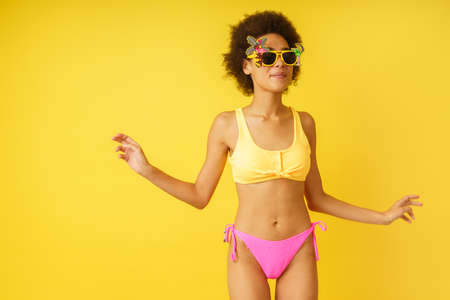 Happy happy girl is ready to the summer in swimsuitの写真素材