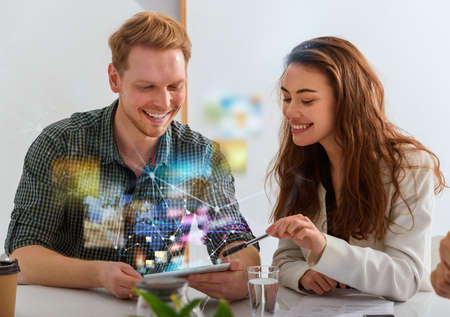 Businessman works in office with a tablet connected on internetの写真素材