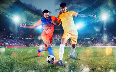 Football scene with competing football players at the stadium