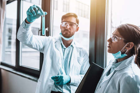 Medical science laboratory works on bacteria research against covid-19 coronavirus