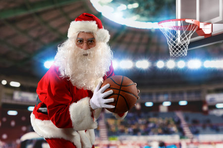 Santa claus ready to play basketball for Christmasの写真素材