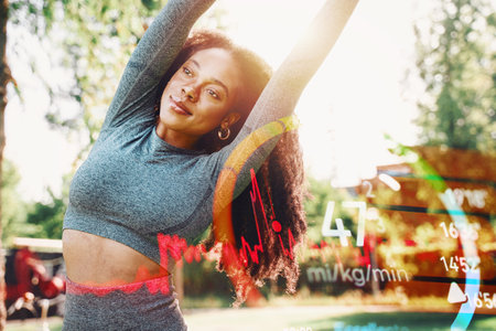 Woman does gym stretching exercises outdoor in a sunny day