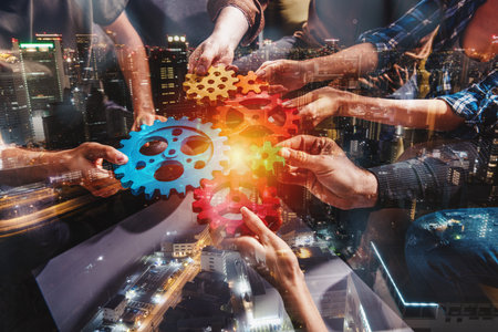Business team connect pieces of gears. Teamwork, partnership and integration conceptの写真素材