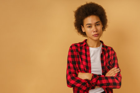 Thoughtful serious woman having doubts about somethingの写真素材