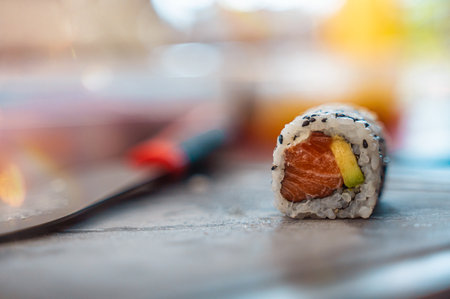 Close up of tasty japanese uramaki sushi with salmonの写真素材