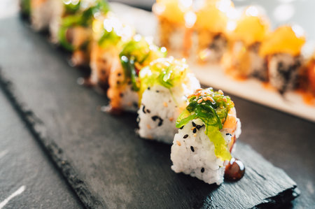 Close up of tasty japanese uramaki sushi with salmonの写真素材