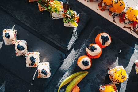 Close up of tasty japanese uramaki sushi with salmonの写真素材