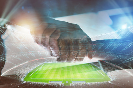 Agreement with an handshake of two soccer manager in a football stadiumの写真素材