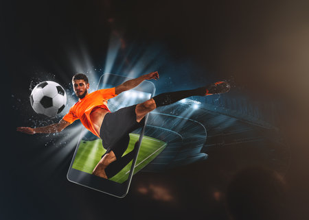 Watch a live sports event on your mobile device. Betting on football matchesの写真素材