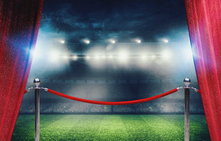 Football stadium with losed event of VIP soccer match delimited by barriers red rope lineの写真素材
