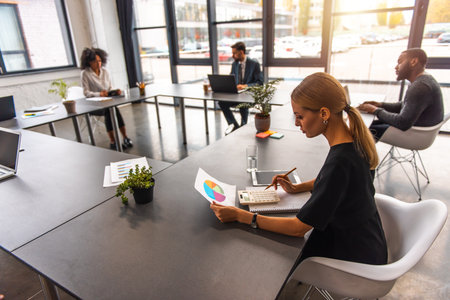 Group of business people have a meeting about company statsの写真素材