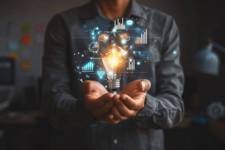 Businessman presents a glowing light bulb surrounded by virtual infographics, symbolizing innovationの素材
