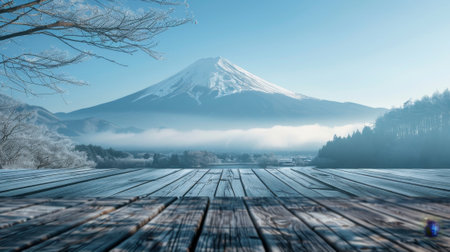 Empty wooden table top with mount fuji background in winterの素材