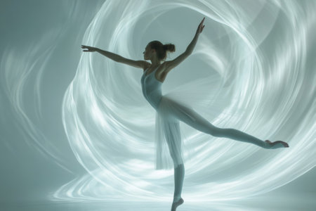 Graceful ballerina performing with flowing light trails, a captivating danceの素材