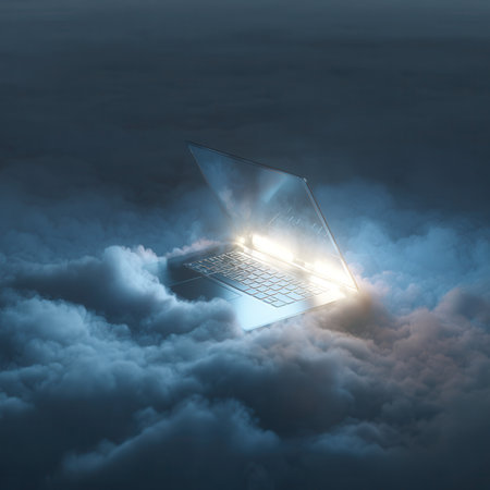 Laptop emitting light standing on clouds at night, cloud computing conceptの素材