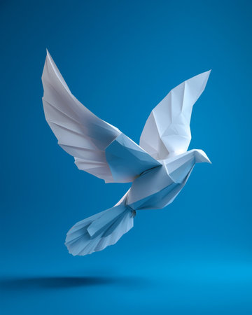 Origami white dove soaring gracefully in a blue backgroundの素材