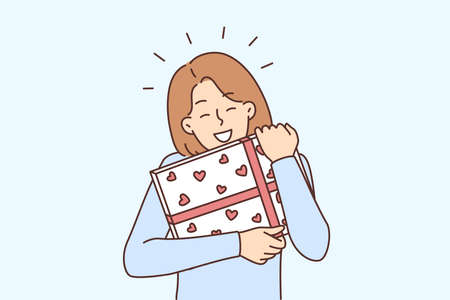 Happy woman holding present in handsのイラスト素材