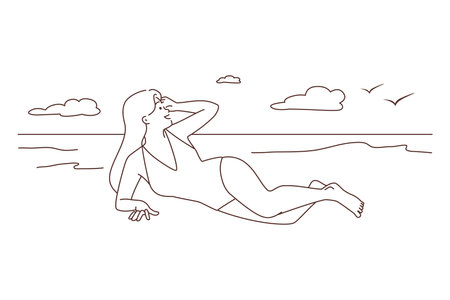 Woman in bikini lying on beachのイラスト素材