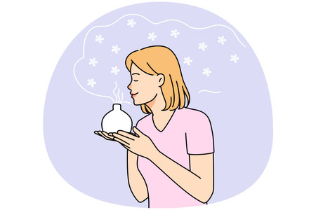 Young woman smell fragrance from aromatherapy diffuserのイラスト素材