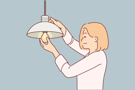 Woman independently changes burned-out light bulb in order to achieve high-quality lighting in houseのイラスト素材