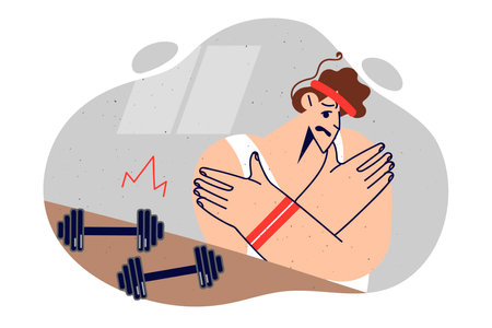 Weak man in gym stands near dumbbells for fitness and holds hands, trying to correct muscle painのイラスト素材