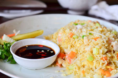 Fried rice with chilli fish sourceの写真素材