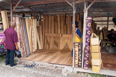 SARAWAK, MALAYSIA-JUNE 2: Kasah or traditional Bidayuh's mattress on sale at the Serikin weekend market near Malaysia/Indonesia border on June 2, 2012. Kasah is a very durable mattress made from rattan and tree barkのeditorial素材