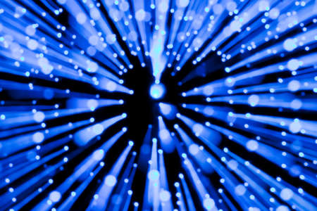Blue lights blur zoom abstract backgroundの写真素材