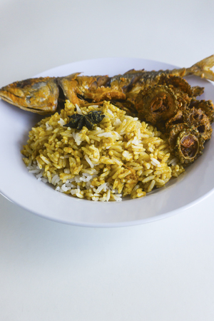 Traditional Malaysian Cuisine. Steamed rice, deep fried mackerel and bitter gourdの写真素材