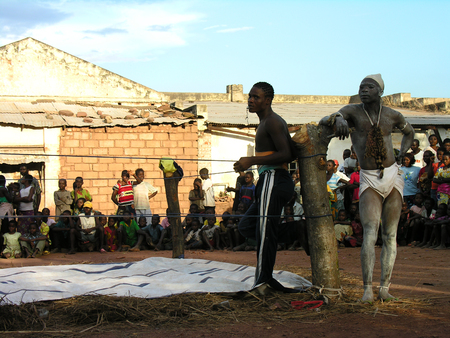 Pweto, Katanga, DRC, 20th May 2006> Wrestlers awaiting the fightのeditorial素材