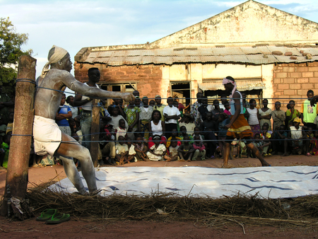 Pweto, Katanga, DRC, 20th May 2006> Wrestlers awaiting the fightのeditorial素材