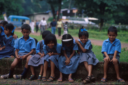 Goa, India, circa september 20002: Children on a school trip to Goa Cathedral smiling for the cameraのeditorial素材