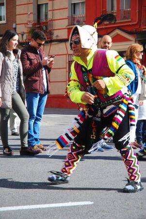 Madrid, Spain, March 2nd 2019: Carnival parade, Member of Bolivian Association dancingのeditorial素材