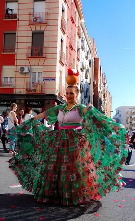 Madrid, Spain, March 2nd 2019: Carnival parade, Woman from Paraguayan dance group posing with traditional costumeのeditorial素材