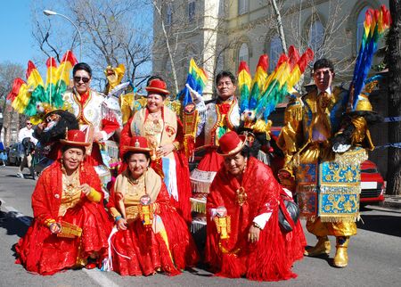 Madrid, Spain, March 2nd 2019: Carnival parade, members of Bolivian dance group posing with traditional costumesのeditorial素材